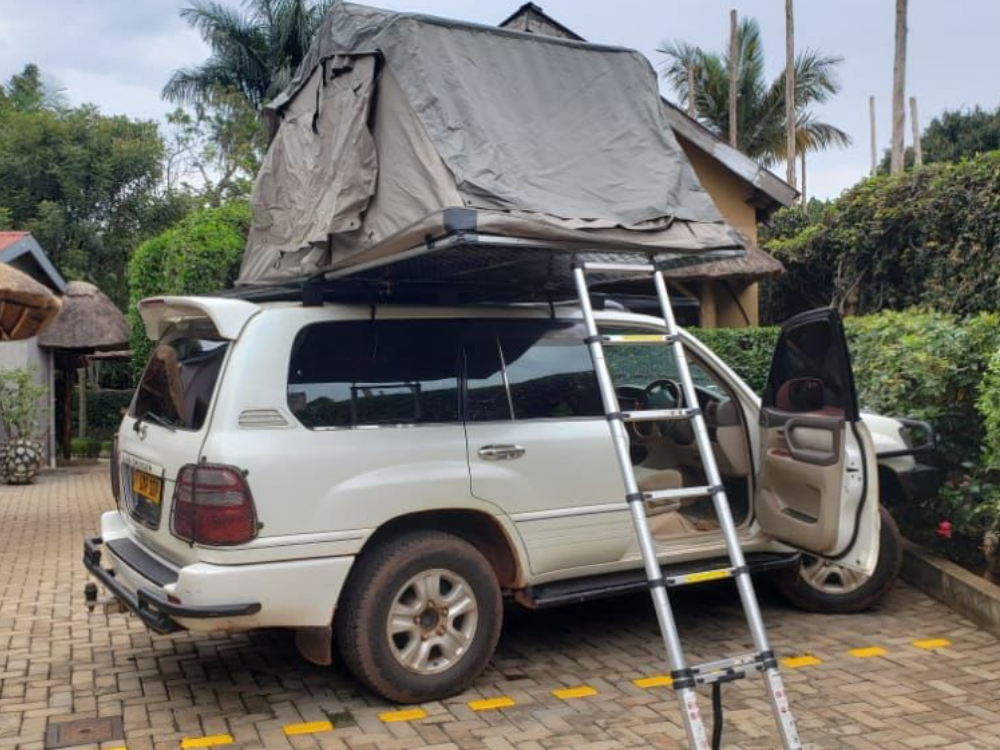 Land cruiser v8 with a rooftop tent